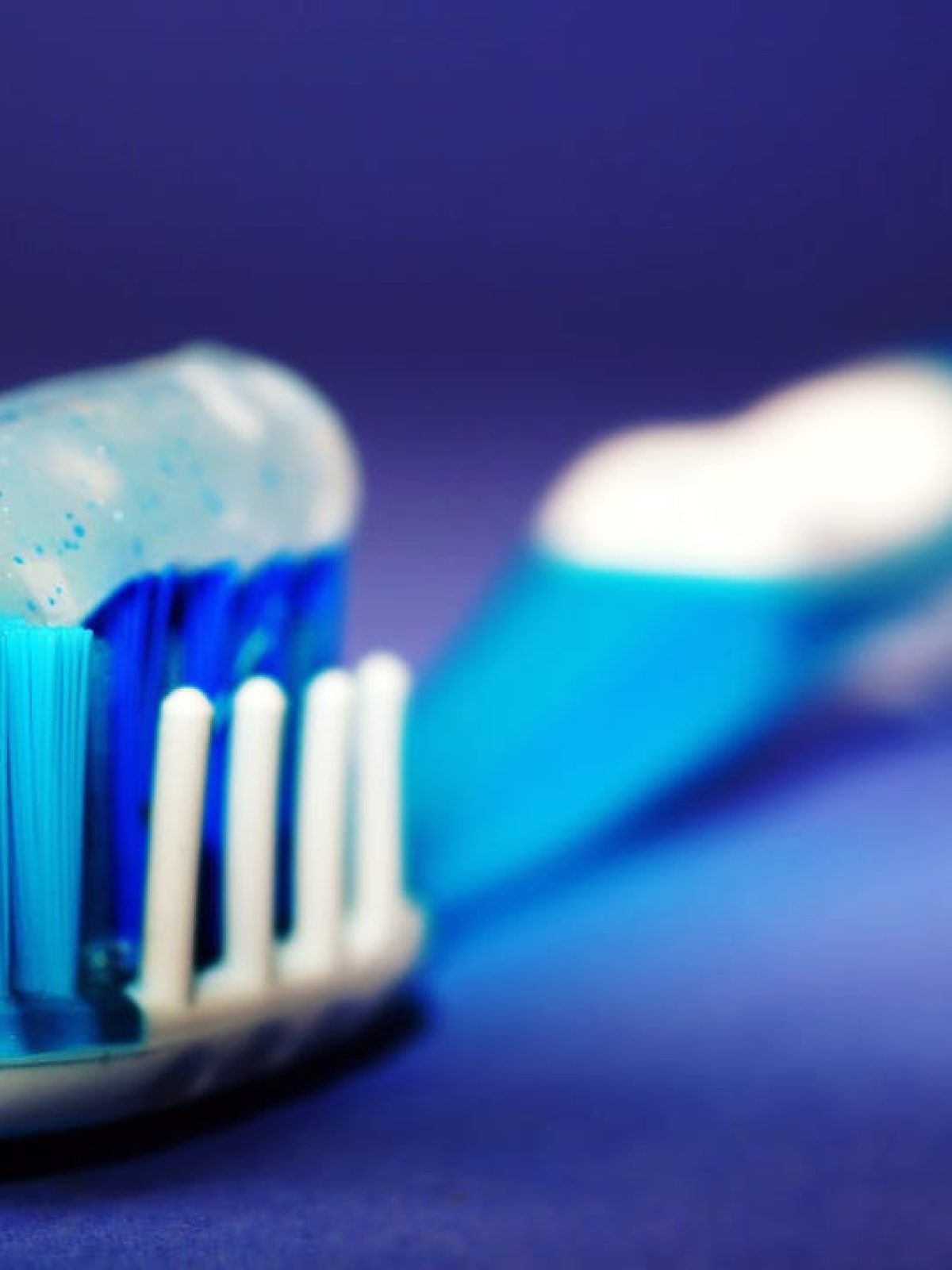 Closeup and Selective Focus Photography of Toothbrush With Toothpaste